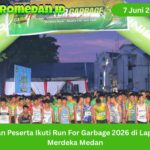 Ratusan peserta mengikuti Run For Garbage 2026 di Lapangan Merdeka Medan sebagai kampanye lari sehat dan peduli sampah.